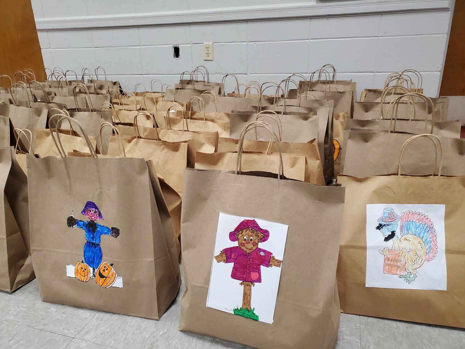 HOLIDAY COLORS: Bags brightly decorated by seniors ready to go.